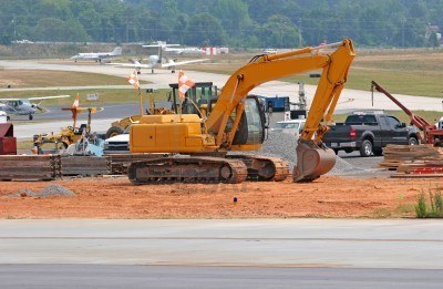E._1291211-heavy-construction-equipment-working-on-an-airport-runway